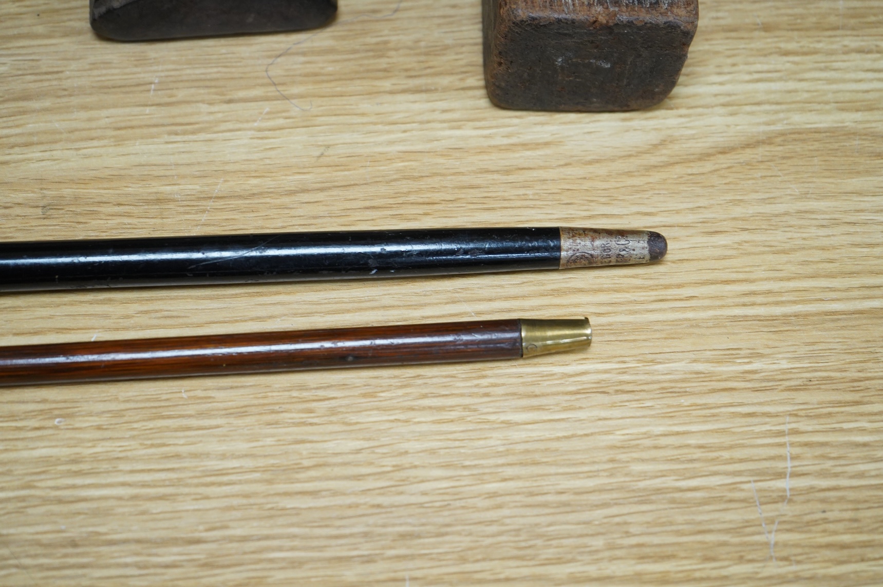 Two silver topped walking canes, largest 94cm in length